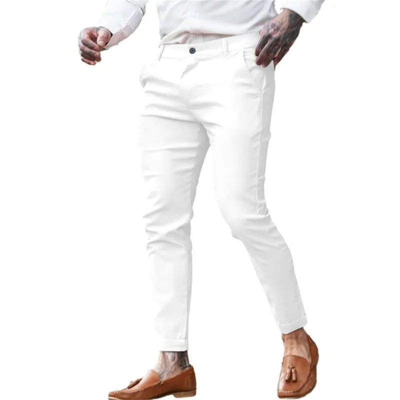 Men's slim fit pencil pants in cotton stretch fabric showing mid waist design and zipper fly closure