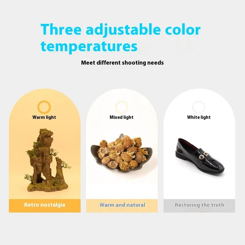 50cm foldable studio light box with three-colour LED lights and reflective cloth interior for product photography.