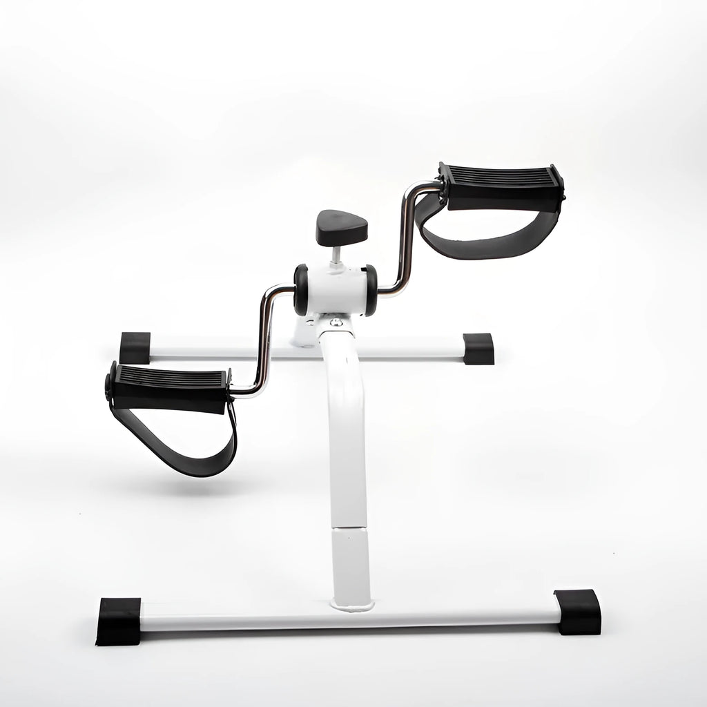White mini exercise bike with mechanical resistance, non-slip pedals, rubber feet and 150kg maximum load