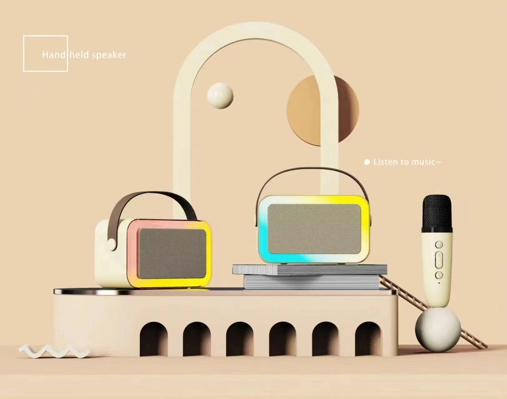 Pink portable Bluetooth karaoke speaker with coloured lights and built-in microphone on a white background.