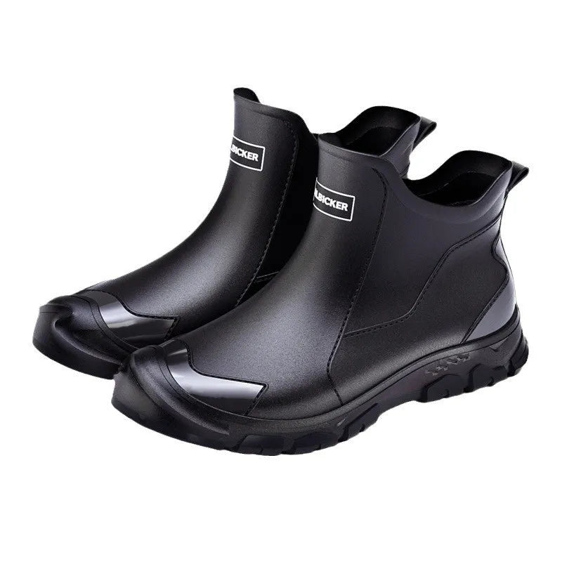 PVC outdoor wading shoes in black and red with a non-slip plastic sole and short-tube design.