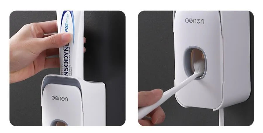 A blue automatic toothpaste dispenser mounted on a bathroom wall with a soft-touch button.