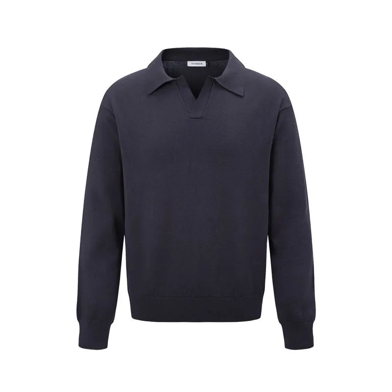 Man wearing a loose black pullover bottoming shirt for casual layered outfit.
