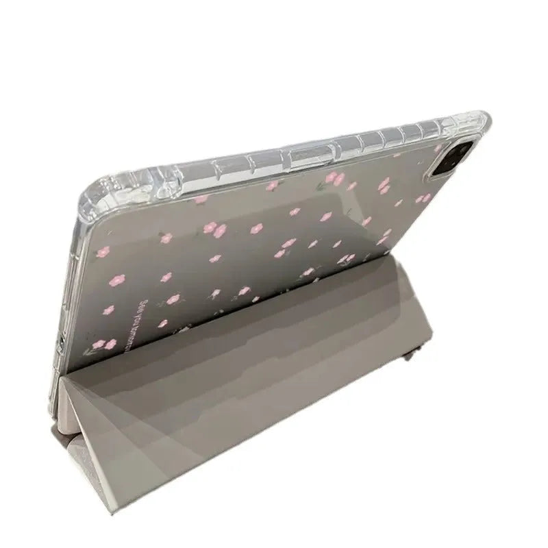 Transparent tri-fold iPad case with floral pattern showing built-in stand angle.