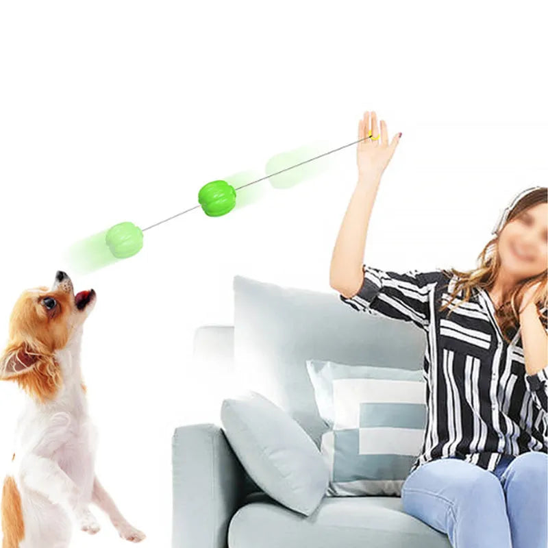 Pumpkin-shaped plastic dog ball with squeaker in green, orange and yellow colours for small dogs