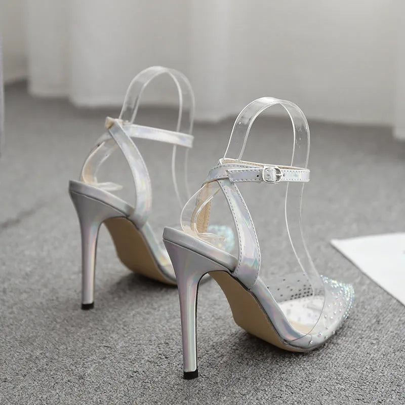 Women's pointed toe stiletto heel sandals with a PVC upper, shown on a size chart.