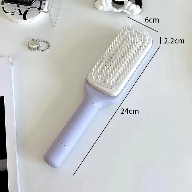 Roland purple self cleaning hair brush with rotating handle and anti-static bristles