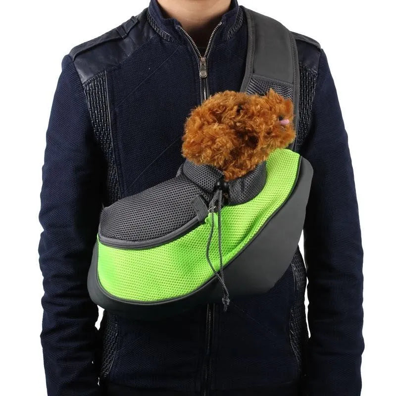 Polyester pet backpack carrier for a small dog or cat, shown in blue colour.