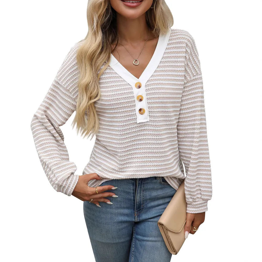 Women's loose fit apricot V-neck long sleeve pullover top with patchwork design detail on front.