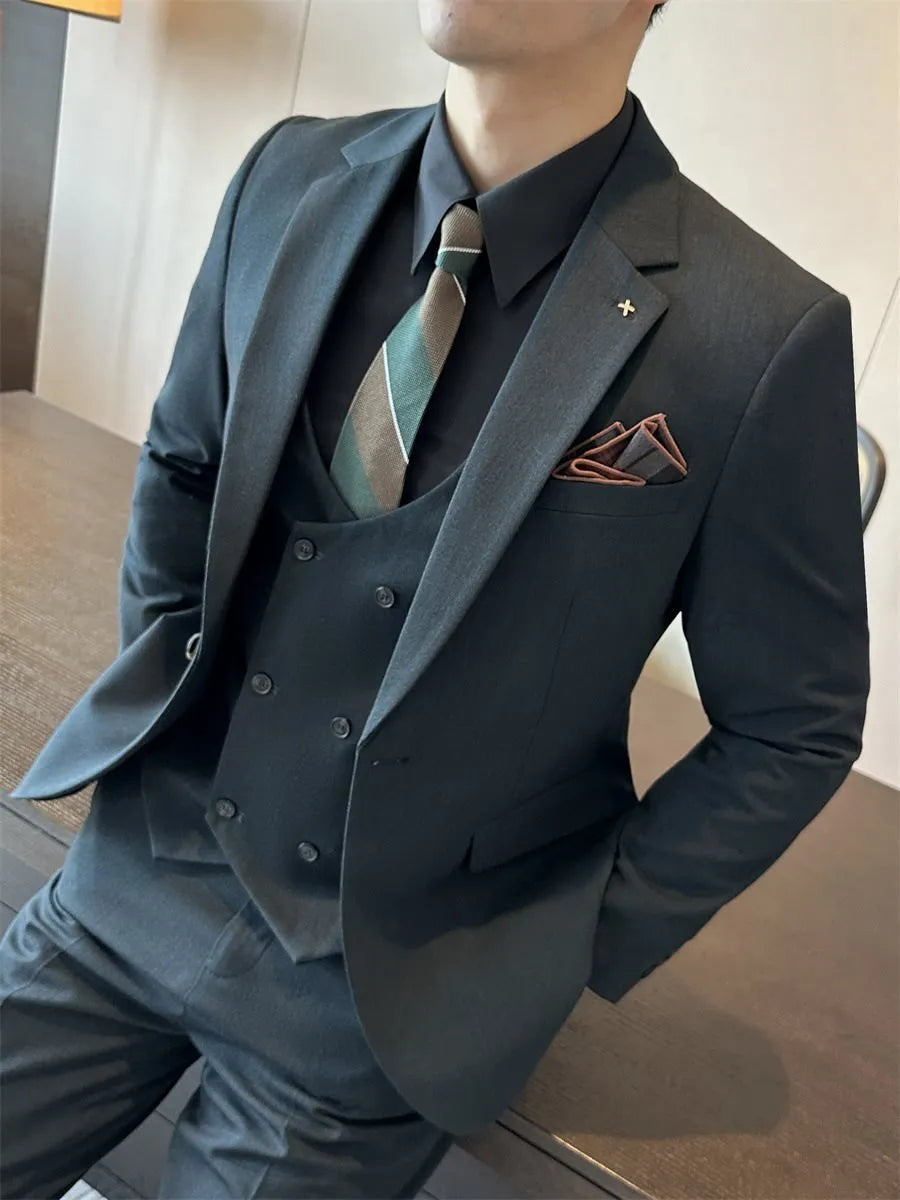 Men's slim fit business formal jacket in a chemical fibre blend fabric, shown in a dark green colour.