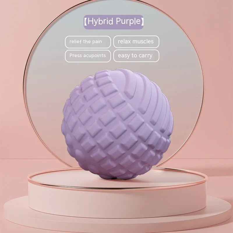 Blue TPR foot massage ball with textured surface shown next to foot for scale