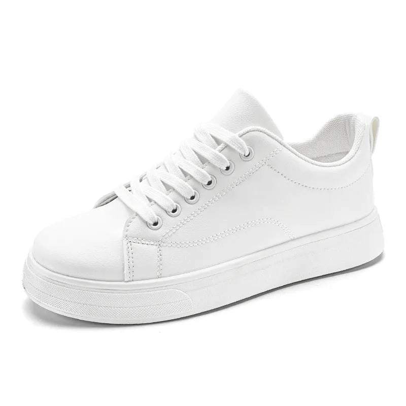 Men's low-top Korean-style sneakers in all black, all white, and black with white bottom colours on a rubber sole
