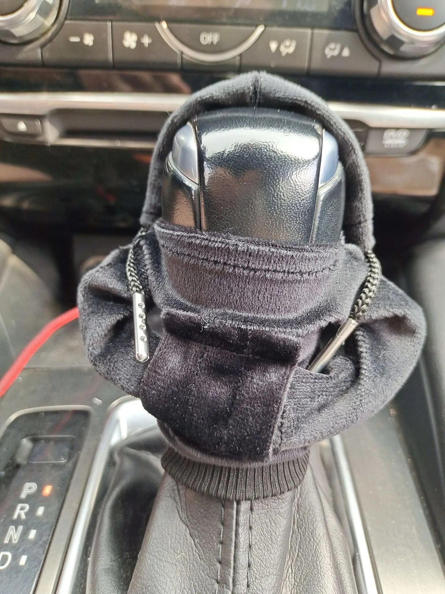 Pure cotton car gear lever sweater decoration in multiple colours on a gear knob.