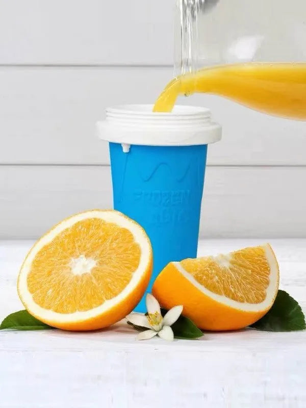 Blue double wall silicone cold shake cup with cylindrical shape and pinch activation for instant beverage cooling