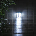 Solar wall lamp with 6 LEDs and IP65 waterproof rating for outdoor garden and courtyard lighting