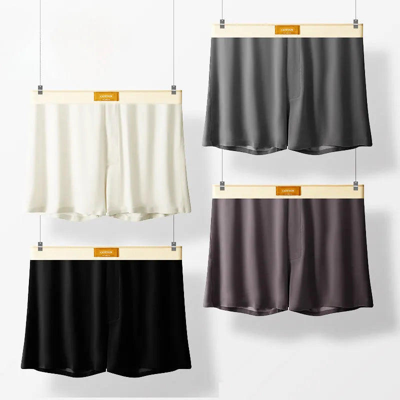Pack of three men's loose fit solid colour underwear in ice silk fabric.