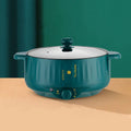 Stainless steel electric cooking pot with non-stick surface and multiple cooking functions
