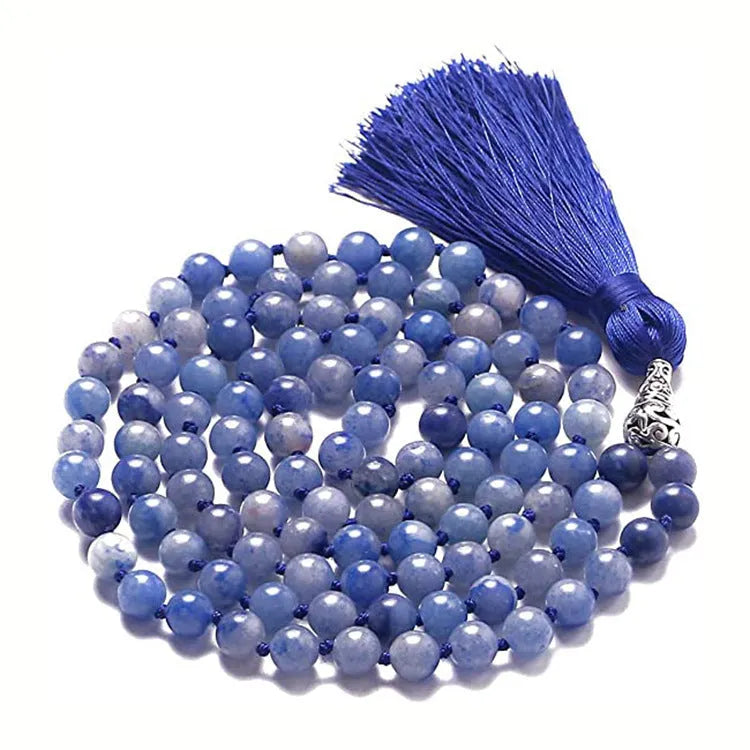Long beaded agate necklace with geometric stones and a tassel, showing colourful variations.