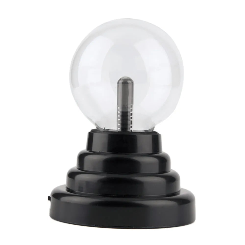 Coloured glass magic ball light on a white ABS base with a USB cable.