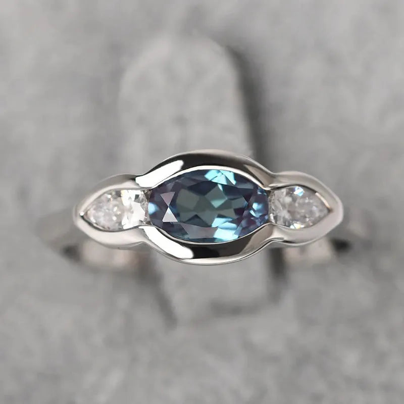 Geometric ellipse copper ring with zircon stone inlay and white gold finish