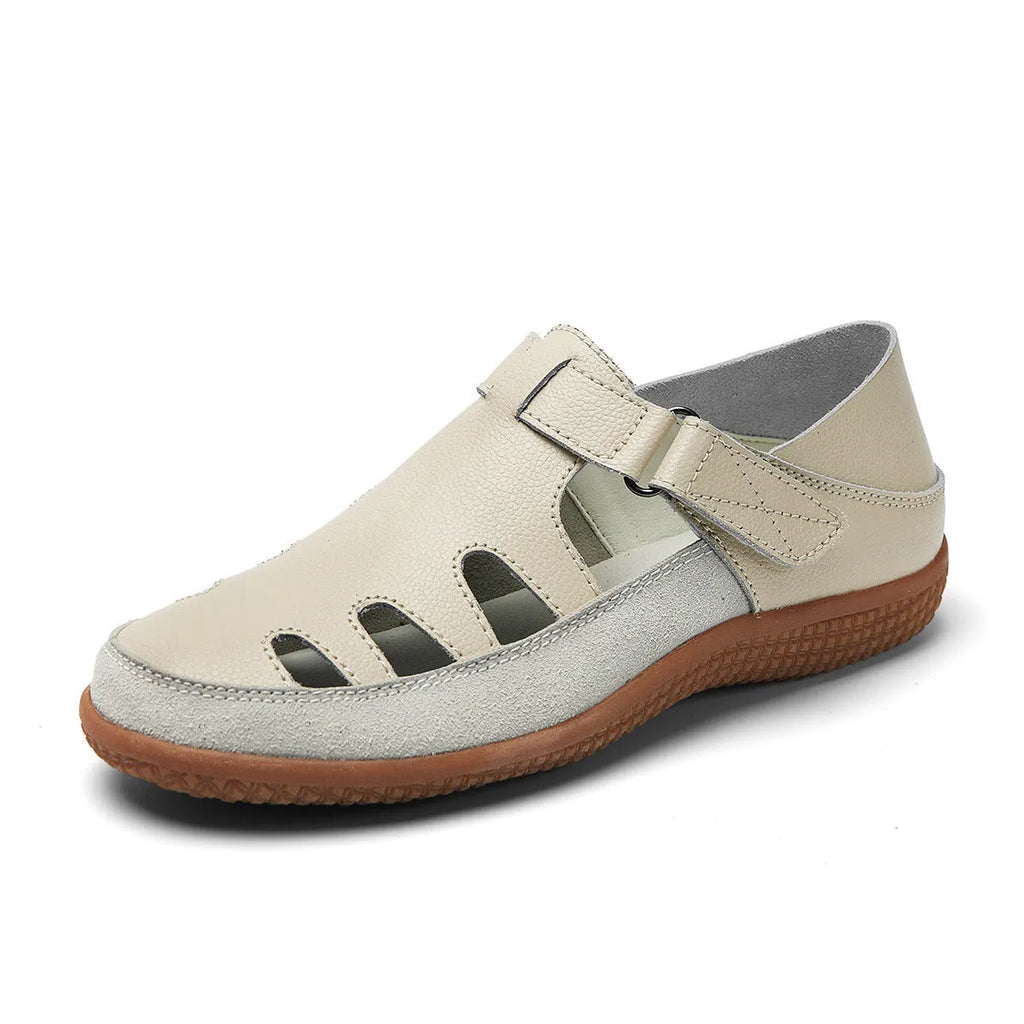 Women's white plus size flat heel sandals with hollow toe cap design and thick rubber sole