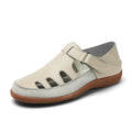 Women's white plus size flat heel sandals with hollow toe cap design and thick rubber sole