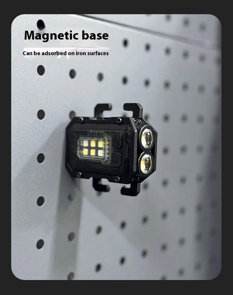 Compact USB rechargeable tactical flashlight with a black mounting clip attached to a backpack strap.