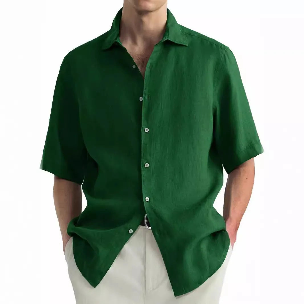 Green washed cotton men's casual shirt with a cardigan style and regular fit on a hanger.