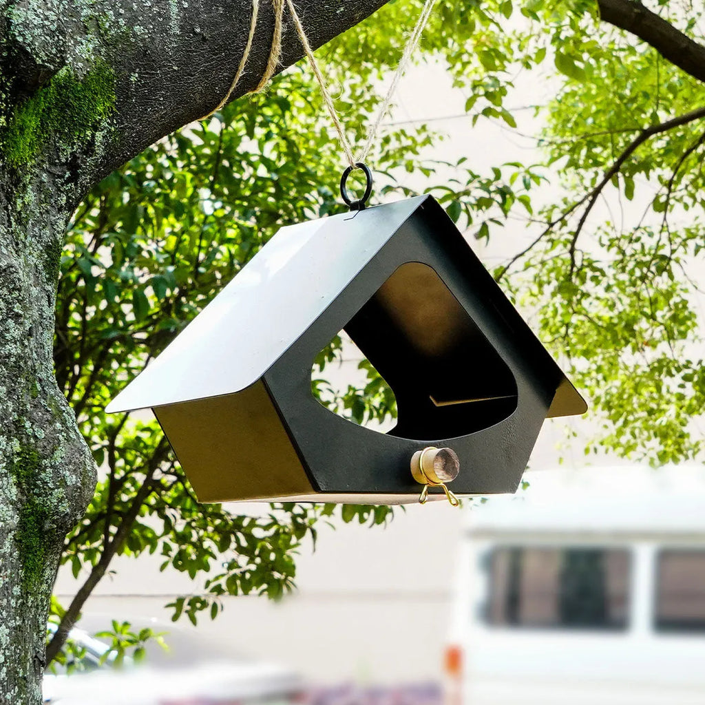Simple modern iron bird nest feeder for outdoor garden decoration.
