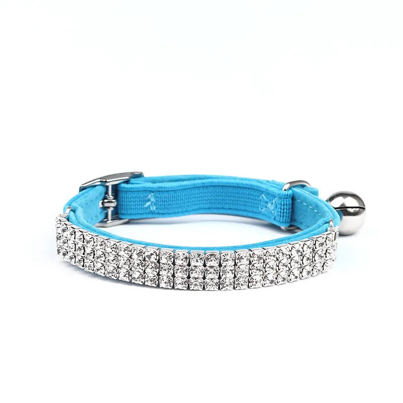 Velvet cat collar with rhinestone decoration showing adjustable 20-30 cm length