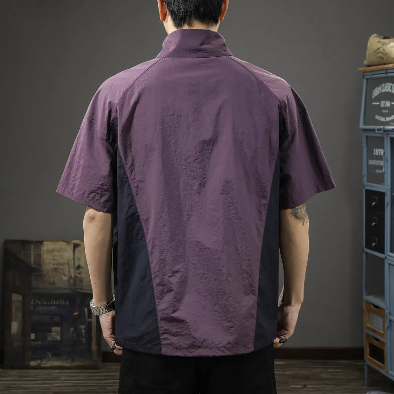 Men's brown half-zip short sleeve casual shirt with a stand collar, shown in a loose fit.