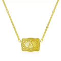 Copper letter necklace with electroplated gold finish showing alphabet pendant