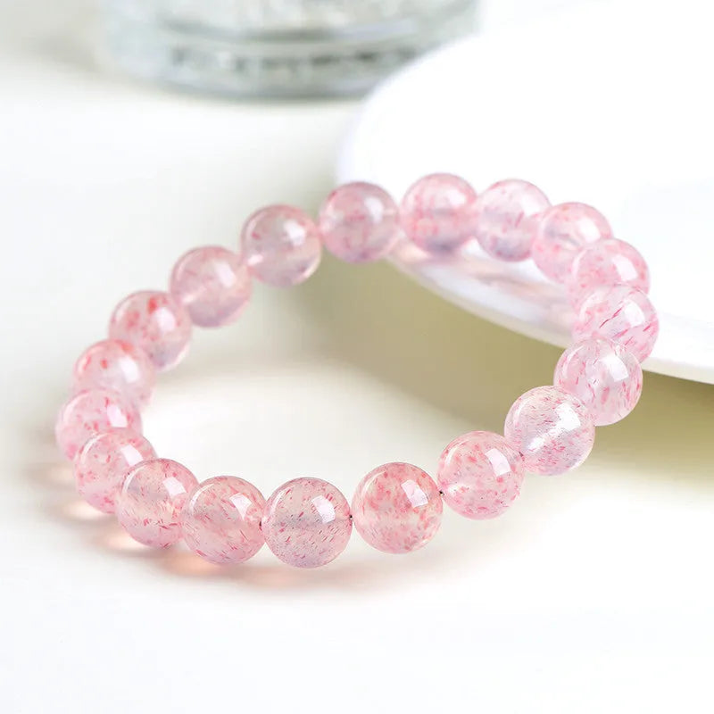 Natural strawberry quartz crystal bracelet with white water colour and 10-10.8mm beads