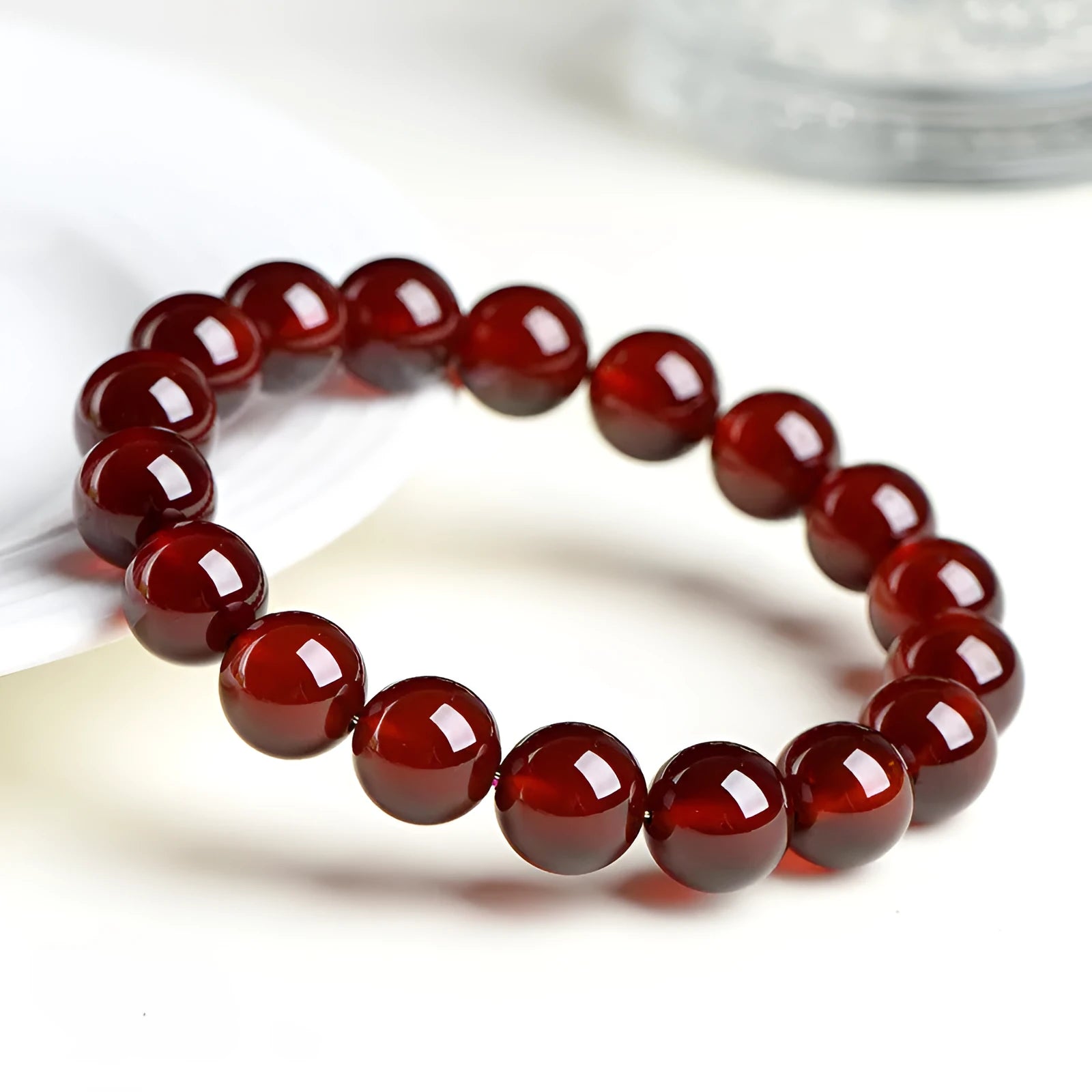 Natural orange red garnet ball bracelet with Ruyi style beads in 5A and 7A grades