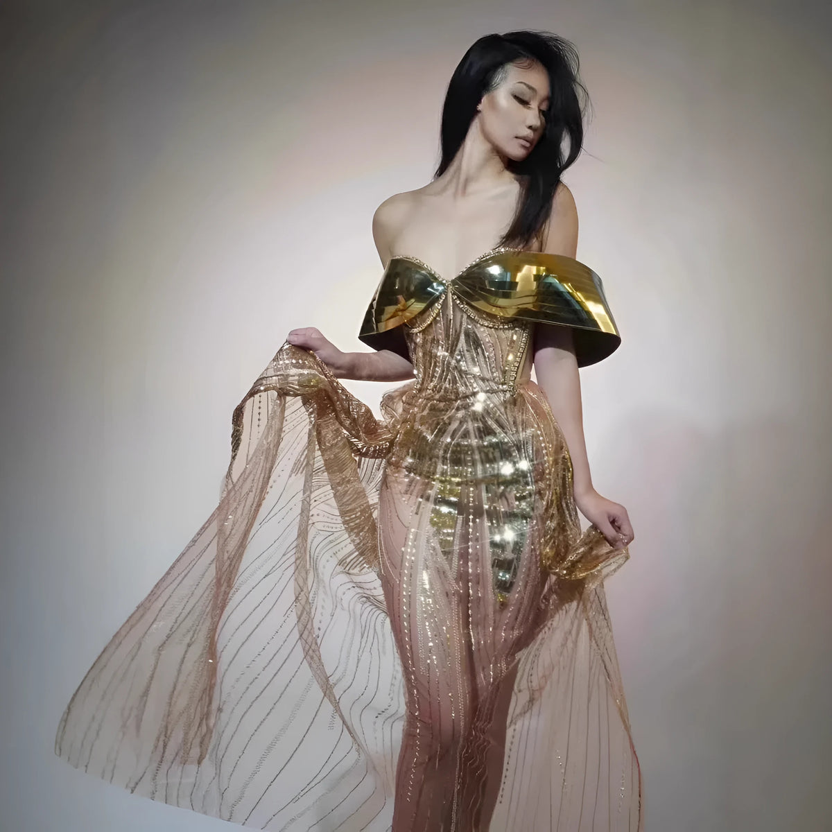 Gold strapless sequin evening dress with thigh-high split and floor-length silhouette