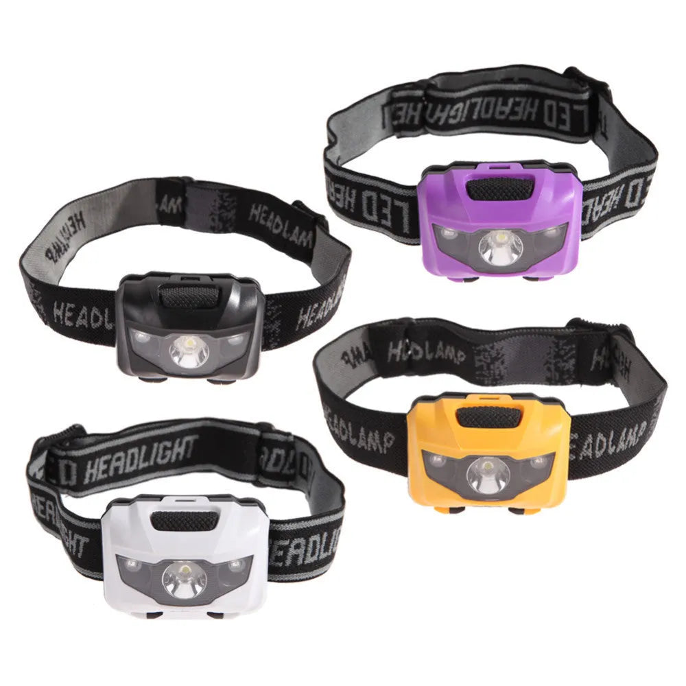 Black outdoor LED headlamp with white and red lights on an adjustable headband.