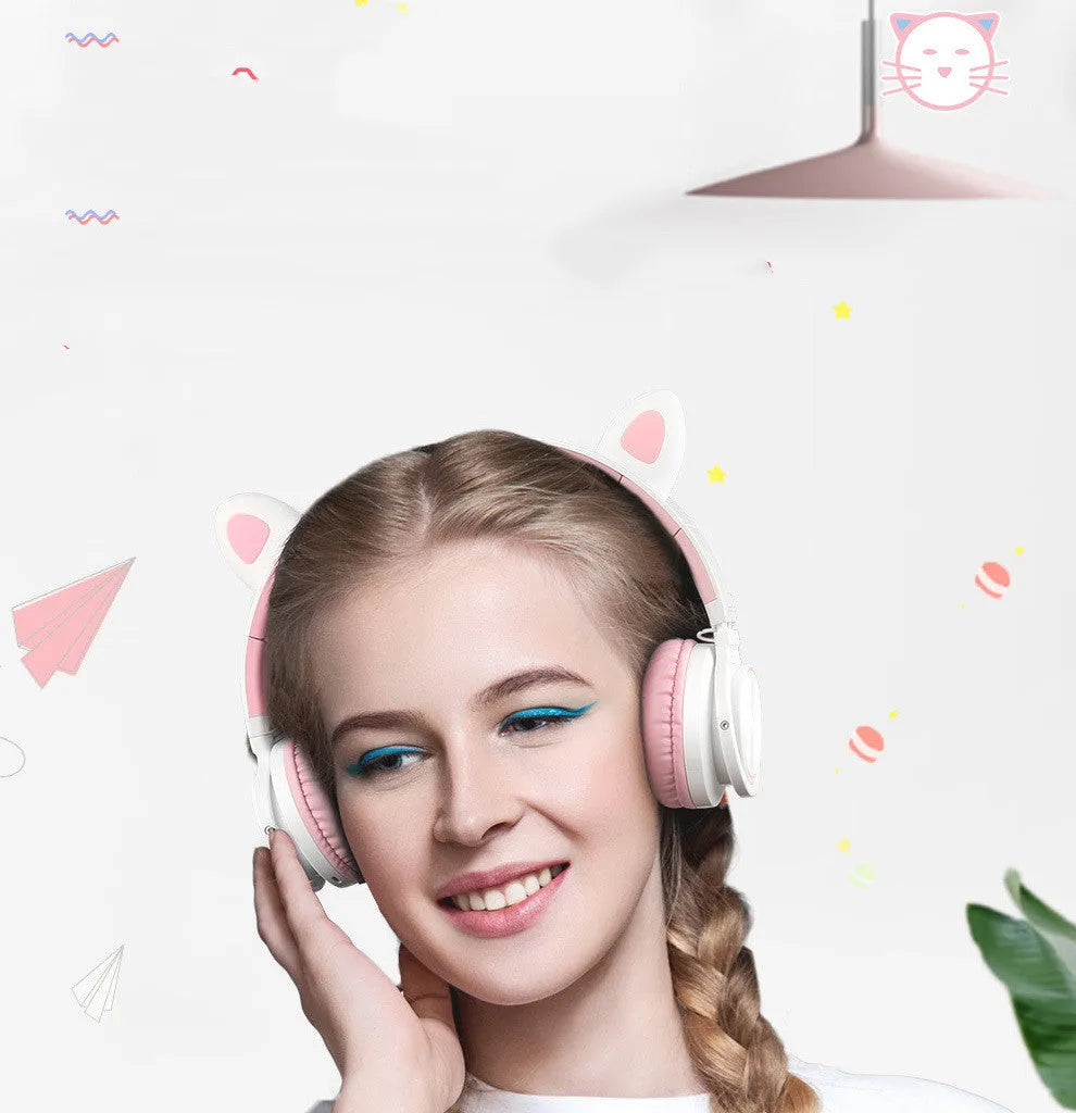 Pink and white wireless Bluetooth headset with head-mounted design and 40mm speakers