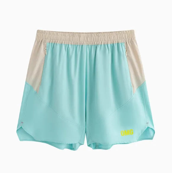 Men's loose grey workout shorts with elastic waist and lace-up fly detail for gym training.