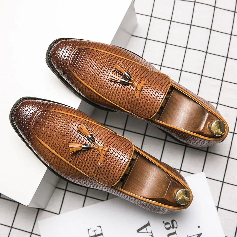 Men's black pointed toe slip on shoes with tassel decoration