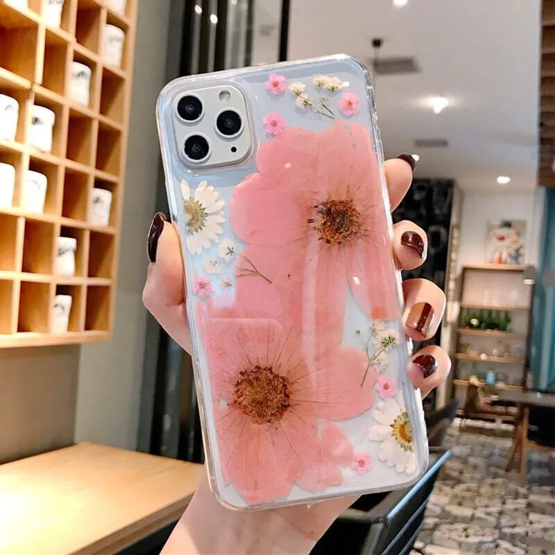 Floral pattern TPU mobile phone case for iPhone in pink and yellow colour options.