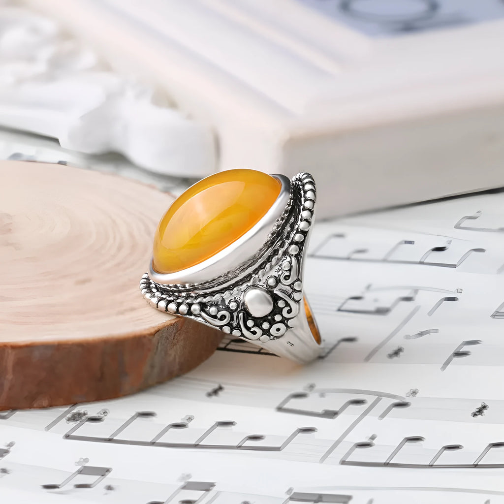 Geometric fluorescent beeswax design alloy ring in antique silver amber finish.