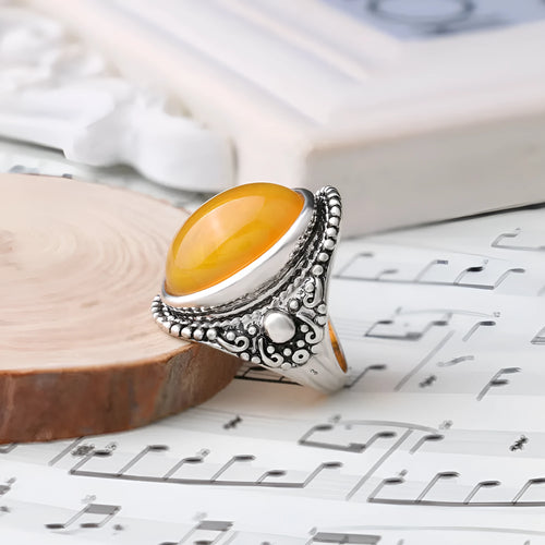 Geometric fluorescent beeswax design alloy ring in antique silver amber finish.