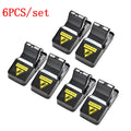 Six black snapping mousetraps showing PC+ABS alloy plastic construction and biting mechanism