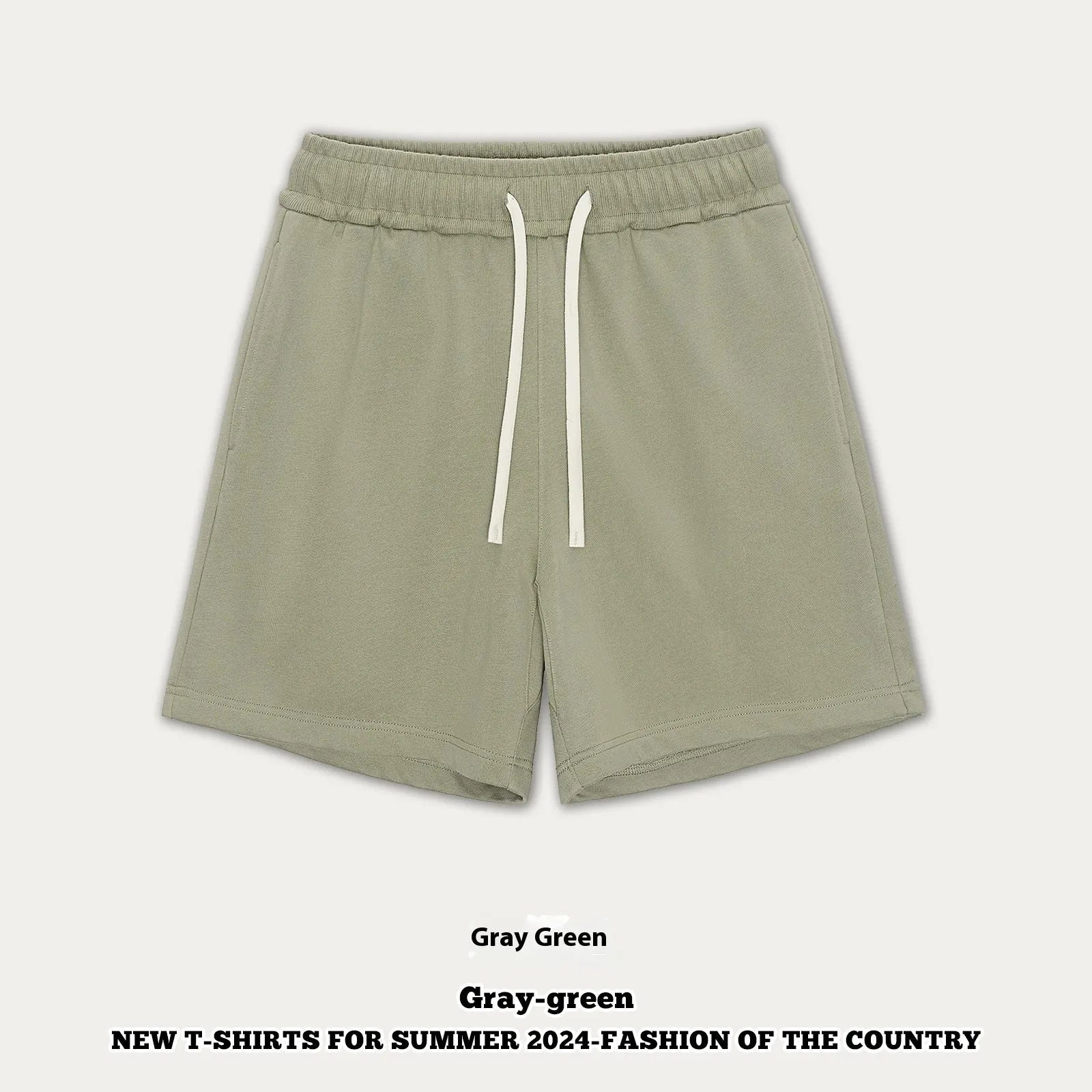 Baby boy and girl wearing loose-fit cotton denim shorts in charcoal grey and cream apricot colours.
