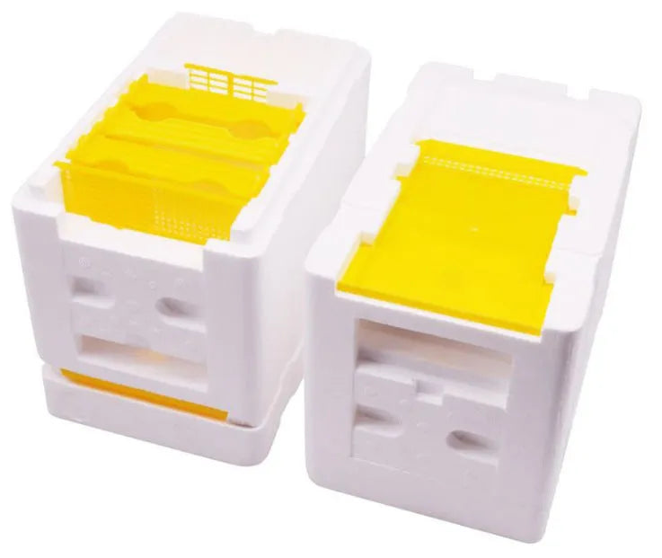 Three white EPS foam bee breeding boxes for hive mating and pollination procedures