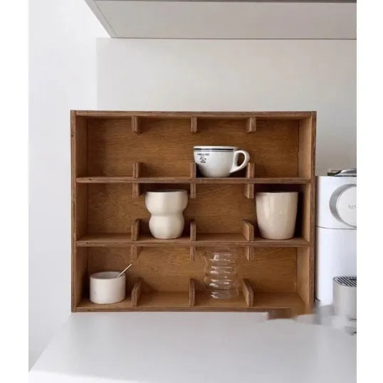 Solid birch wood multi-grid cup storage rack in meridian colour on a kitchen counter.