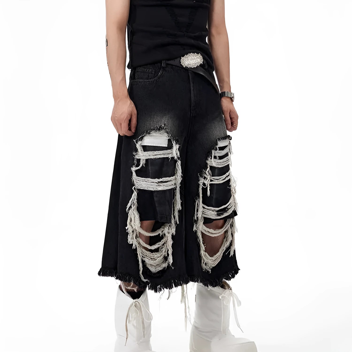 Women's black cropped wide leg jeans with distressed ripped patches and high waist