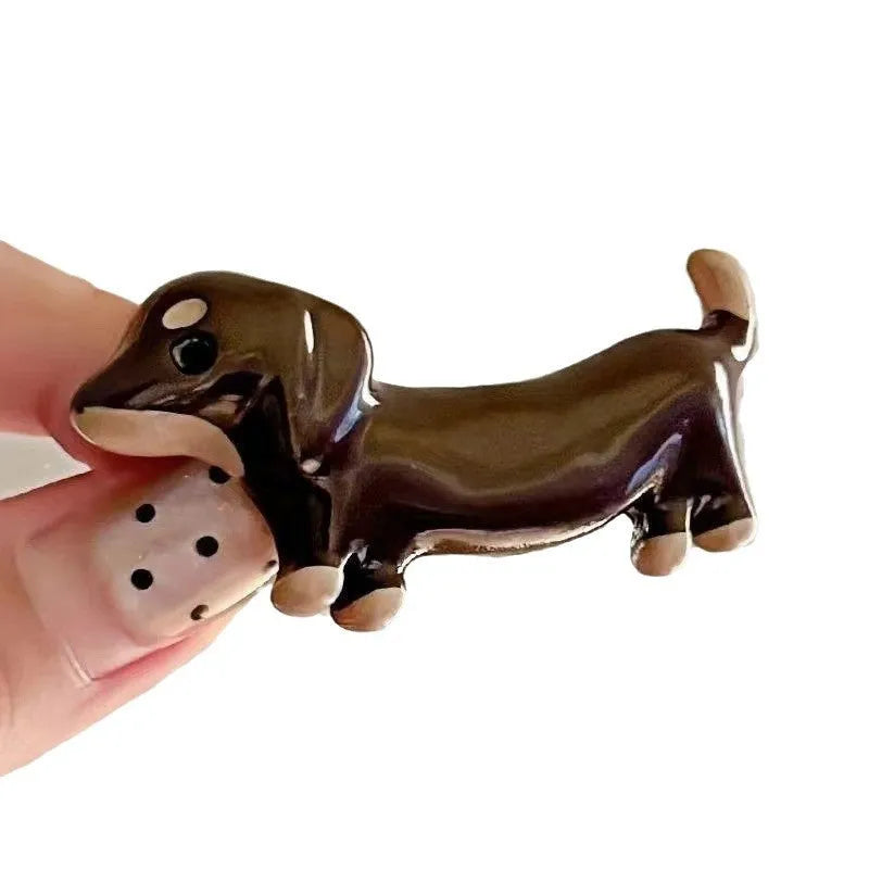 Dachshund dog shaped hair clips with electroplated finish, delicate loose design
