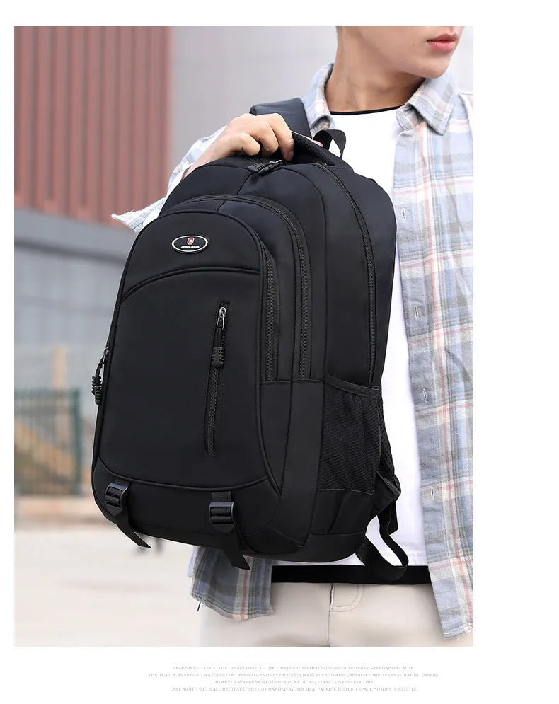 Waterproof nylon school backpack in grey with airpillow straps and contrast stitching.