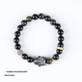 Handmade grey agate and silver lying rabbit charm bracelet on wrist, showing 10mm bead size option.